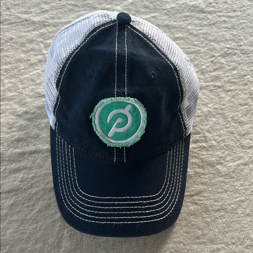 Peloton Navy and White Cap with Green Logo